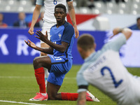 France's forward Ousmane Dembele reacts during the international friendly football match between France and England, on June 13, 2017 at the...
