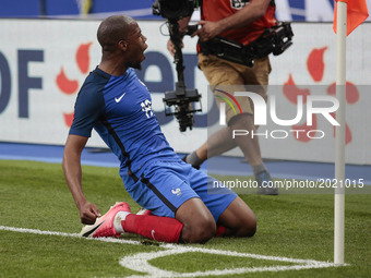 France's defender Djbril Sidibe celbrates after scoring during the international friendly football match between France and England, on June...