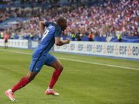 France's defender Djbril Sidibe celbrates after scoring during the international friendly football match between France and England, on June...