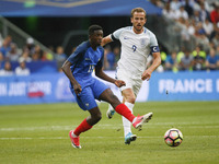 France's forward Ousmane Dembele passes the ball during the international friendly football match between France and England, on June 13, 20...
