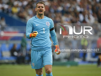 England's goalkeeper Tom Heaton reacts during the international friendly football match between France and England at The Stade de France St...