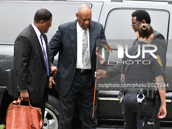 Bill Cosby walks in upon arrival for the sixth day of deliberations the aggravated indecent assault trail of the jury at Montgomery Courthou...