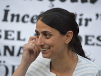Feleknas Uca, Deputy of the pro-Kurdish opposition Peoples' Democratic Party (HDP), laughs during her party's iftar dinner meeting in order...