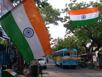 Indian cricket lover hanging Indian national flag  road side during India v Pakistan final ICC  champion trophy Cricket Matches on June 18,2...