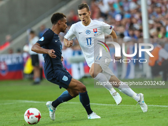 Jacob Murphy (ENG), Lukas Haraslin (SLO)  during the UEFA U-21 European Championship Group A football match Slovakia vs England in Kielce, P...