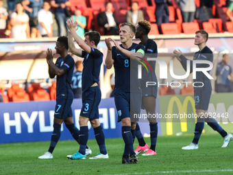 James Ward-Prowse of England and team-mates celebrate after their UEFA European Under-21 Championship match against Slovakia on June 19, 201...