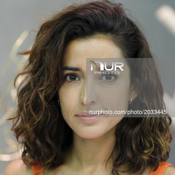 The actress Inma Cuesta poses for the photographers during the press screening of the exhibition Tu Silla Su Refugio in Madrid. June 20, 201...