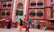 Two Muslim girls playing and enjoying there time during Ramadan month at Nakhoda masjid. K...