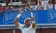 Gilles Muller LUX against Jo-Wilfried Tsonga FRA during Round Two match on the third day o...