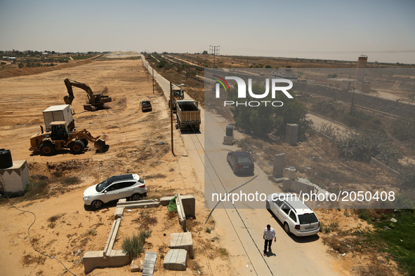 Palestinian machineries operate on border with Egypt, in Rafah, Gaza Strip June 28, 2017. 