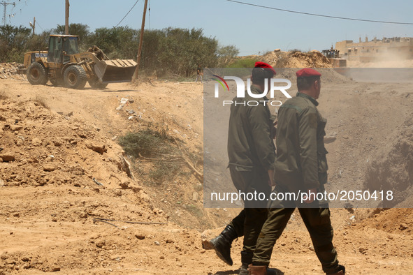 Palestinian machineries operate on border with Egypt, in Rafah, Gaza Strip June 28, 2017. 
