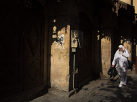 A man walks through the streets of Khan el-Khalili during the holy month of ramadan in Cairo on June 13, 2017 (