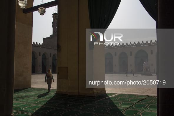 A Woman walks inside Al Anwar mosque in Cairo during the holy month of Ramadan on June 13, 2017 