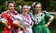 Members of a Mexican dance group take part in a multi-cultural Canada Day parade at Queens...