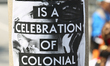 Posters protesting Canada Day and the 150th anniversary of confederation as part of a nati...