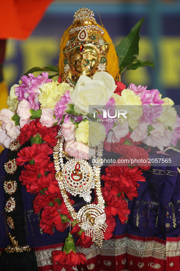 A Hindu Goddess is venerated as Her Holiness Amma Sri Karunamayi performs special prayers during the Homa (sacred fire ceremony) at the Bhuv...