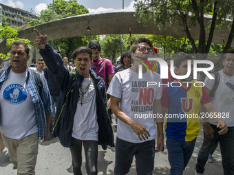 Students of the Central University of Venezuela during a rally. Demonstrators use mask to cover their faces from the security forces. Caraca...