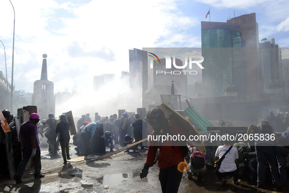 Security forces suppress a rally with water cannons. Caracas on Friday 19 of May.  This July 9th, Venezuela will reach 100 days of protest a...