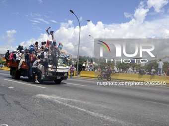 Demonstrators kidnap a truck to mobilize other demonstrators during a rally. Caracas on Friday 26 of May.  This July 9th, Venezuela will rea...
