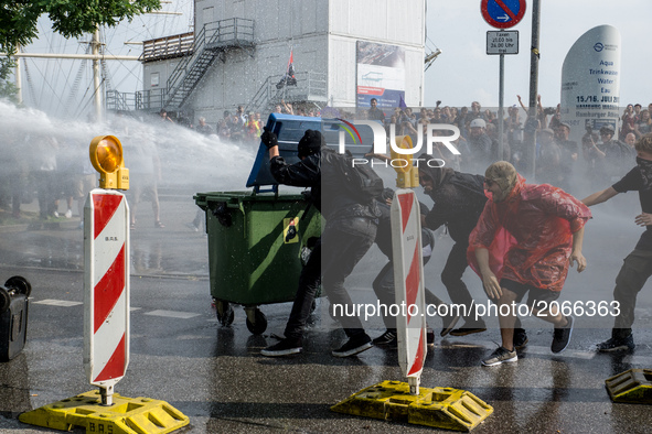Violent mass demonstrations took place in several flash points throughout Hamburg as German riot police confronted Anti capitalism and radic...