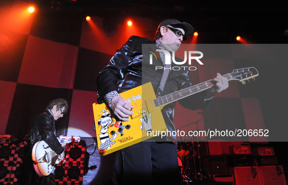 Tom Petersson (L) and Rick Nielsen perform with Cheap Trick at Emo's on May 16, 2014 in Austin, Texas. 