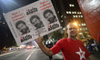 Supporters of Brazil's former president Luiz Inacio Lula da Silva take part in a demo in S...