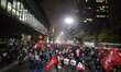 Supporters of Brazil's former president Luiz Inacio Lula da Silva take part in a demo in S...