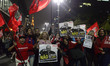 Supporters of Brazil's former president Luiz Inacio Lula da Silva take part in a demo in S...
