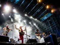 The canadian indie rock band Arcade Fire pictured on stage as they perform at Milano Summer Festival, Ippodromo San Siro Milan, on July 17,...