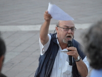 A recently sacked academic speaks during a forum on aftermath of Turkey's constitutional referendum and CHP's justice march in Ankara, Turke...