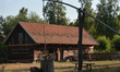 A view of a traditional well in the center of the farm, inside the Folk Culture Open-Air M...