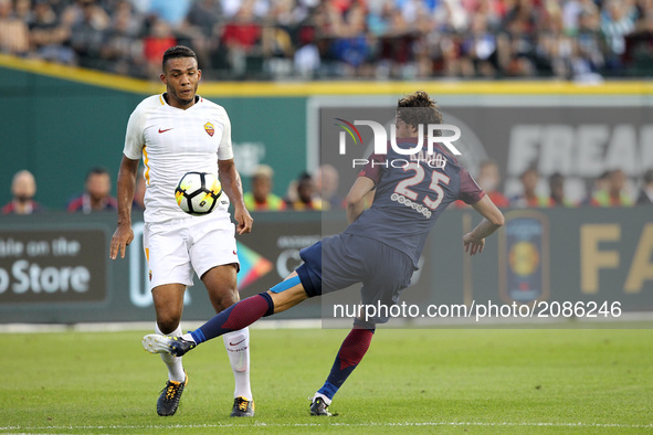 Paris Saint-Germain midfielder Adrien Rabiot (25) vies with Roma defender Juan Jesus (5) during an International Champions Cup match at Come...