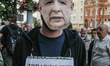 Protester in Jaroslaw Kaczynski mask during the ' Solidarity Chain of Light ' protest are...