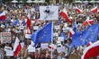 A banner with Jaroslaw Kaczynski's caricatur during a protest at the Main Square against g...