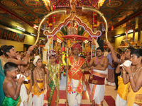 Tamil Hindu priest recites prayers as horns are sounded signifying the end of the procession during the Nambiyaandaar Nambi Ustavam Thiruviz...