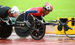 L-R Marcel Hug of Switzerland  and Masayuki Higuchi of Japen compete Men's 5000m T54 Final...