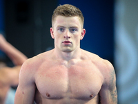 Adam Peaty (United Kingdom) competes in the men's 50-meter breaststroke event at the 17th FINA World Championships in Budapest, on 25 July 2...