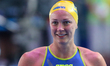 Swedish swimmer Sarah Sjostrom reacts after winning the women's 50m butterfly at the FINA...