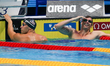 Matt Grevers (USA), Camille Lacourt (FRA),  during the final of the men's 50m backstroke d...