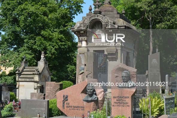 A view historical tombs of Polish families burried in the old part of Lyczakowski cemetery with between more recent Ukrainians tombs from th...