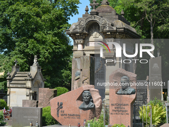 A view historical tombs of Polish families burried in the old part of Lyczakowski cemetery with between more recent Ukrainians tombs from th...