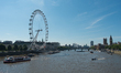 View of the river Thames with London Eye and the Houses of Parliament in a sunny morning i...