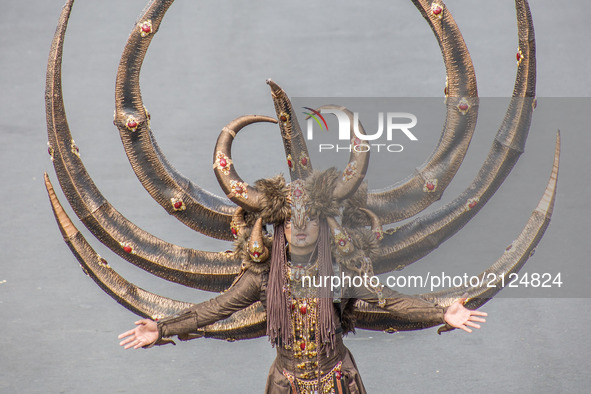  Model shows fashion creations during Grand Carnival as part of the 16th Jember Fashion Carnival on August 13, 2017 in Jember, East Java, In...