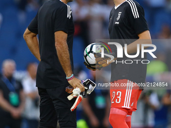 Gianluigi Buffon of Juventus and Wojciech Szczesny of Juventus  during the Italian Supercup match between Juventus and SS Lazio at Stadio Ol...