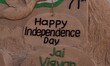 Visitors look near to the Independence Day sand sculpture, creating by sand artist Sudarsh...