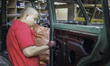 Worker take confirm to coating side at mohenic garages in Paju, South Korea. A 20-year-old...