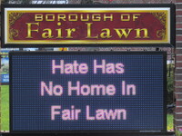 Borough of Fair Lawn sign reading "Hate Has No Home in Fair Lawn" during a Rally for Unity and Peace with Mayor, Councilwoman, full Borough...