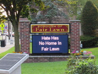 Borough of Fair Lawn sign reading "Hate Has No Home in Fair Lawn" during a Rally for Unity and Peace with Mayor, Councilwoman, full Borough...