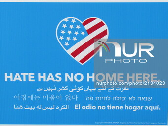 Hate Has No Home Here sign is seen at Women of Action New Jersey Rally for Unity and Peace with Mayor, Councilwoman, full Borough Council an...