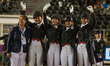 The Danish dressage team arrives at the price giving ceremony for the team dressage compet...